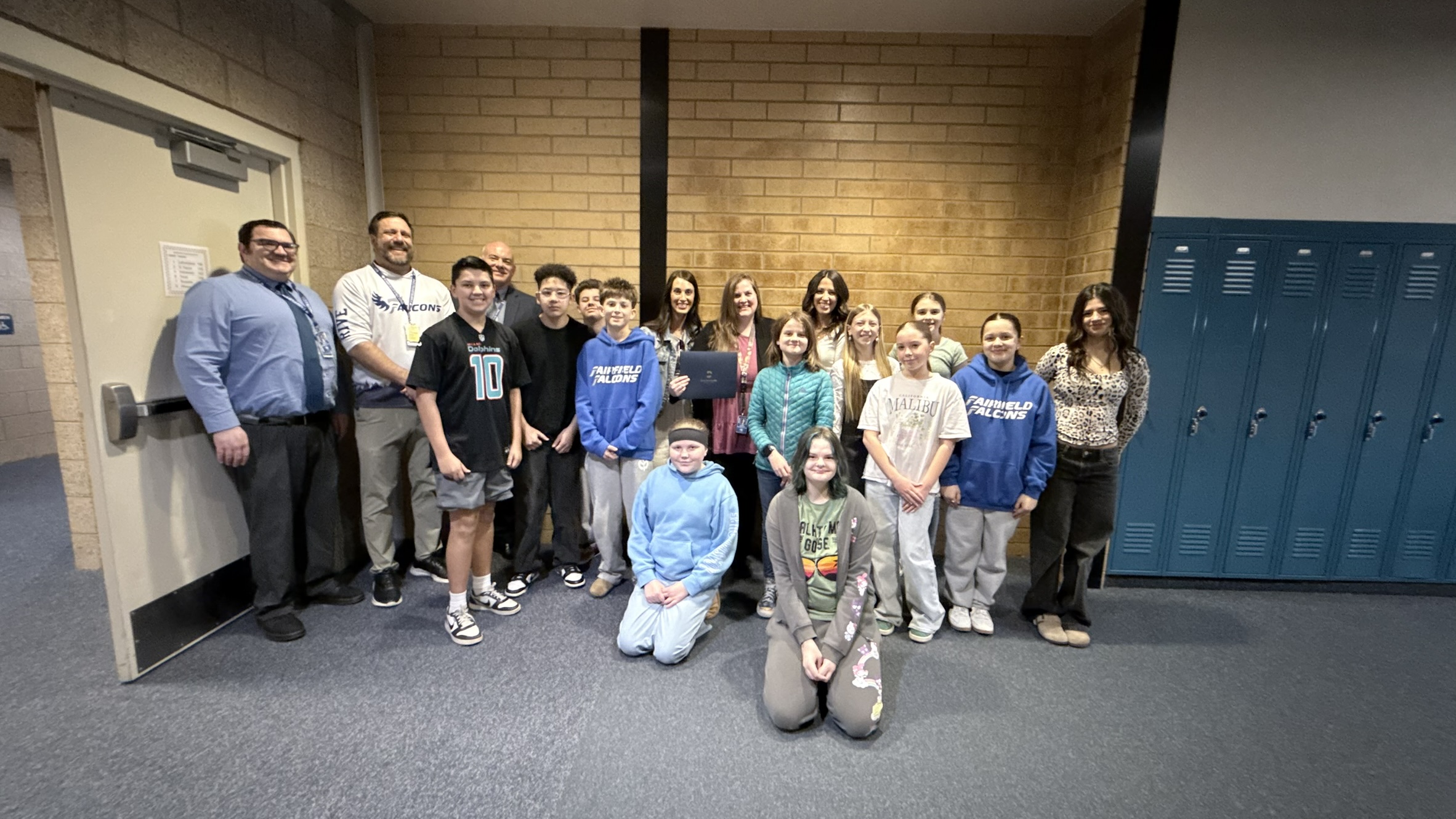 Award presentation at a Davis District secondary school