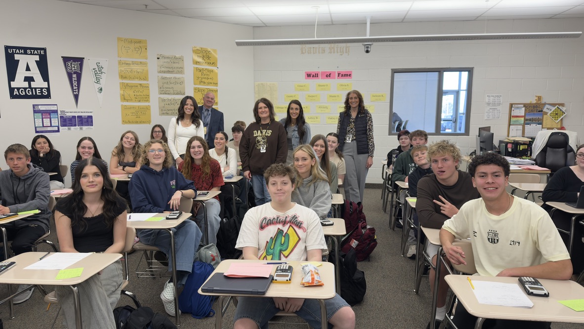 Teacher receiving Excellence in Education recognition