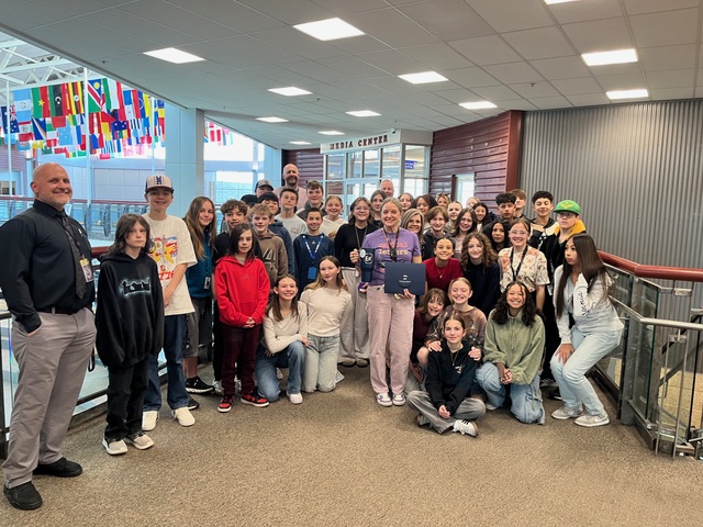 Excellence in Education award moment at a Davis District school