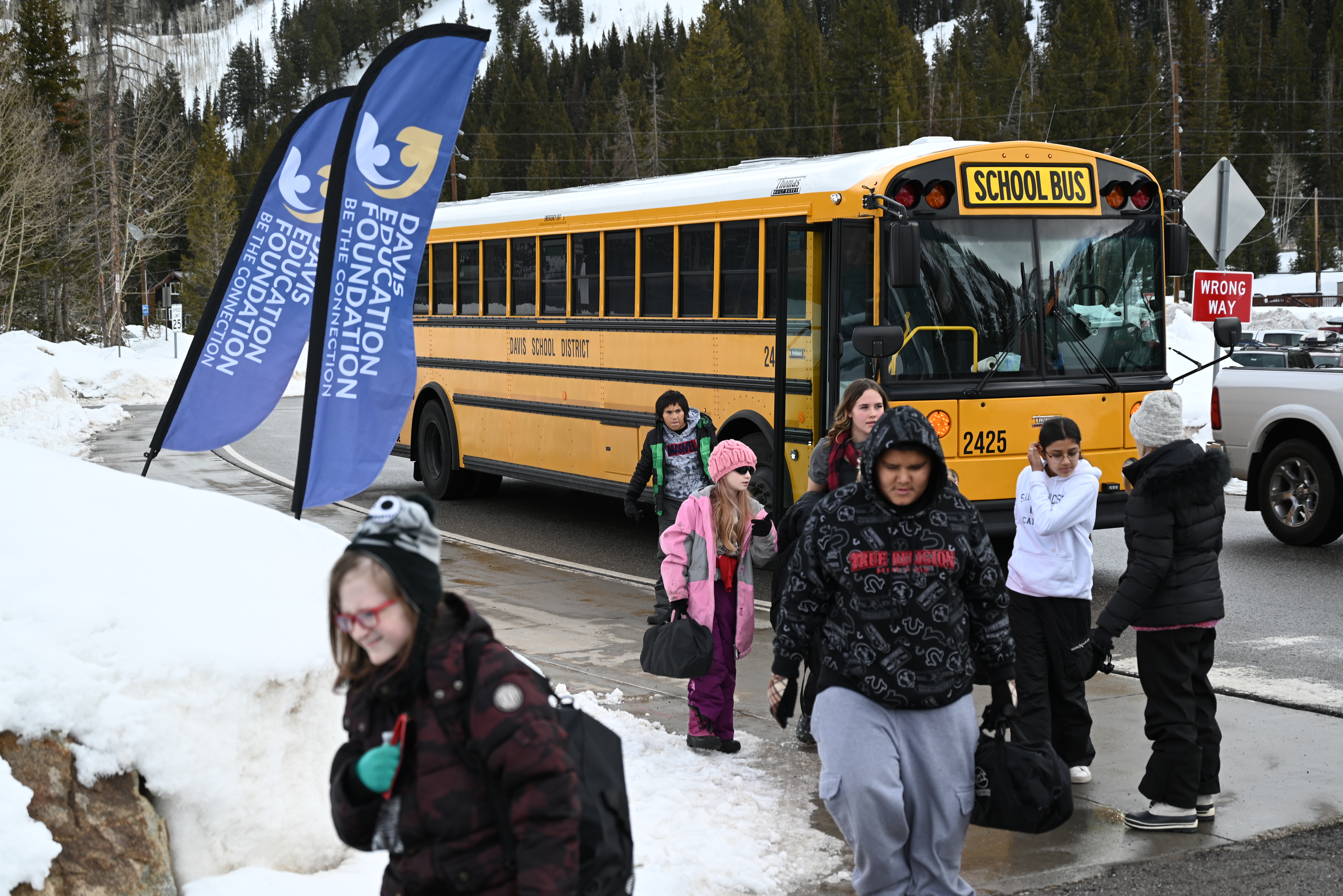 Students arriving by school bus at Solitude Mountain Resort